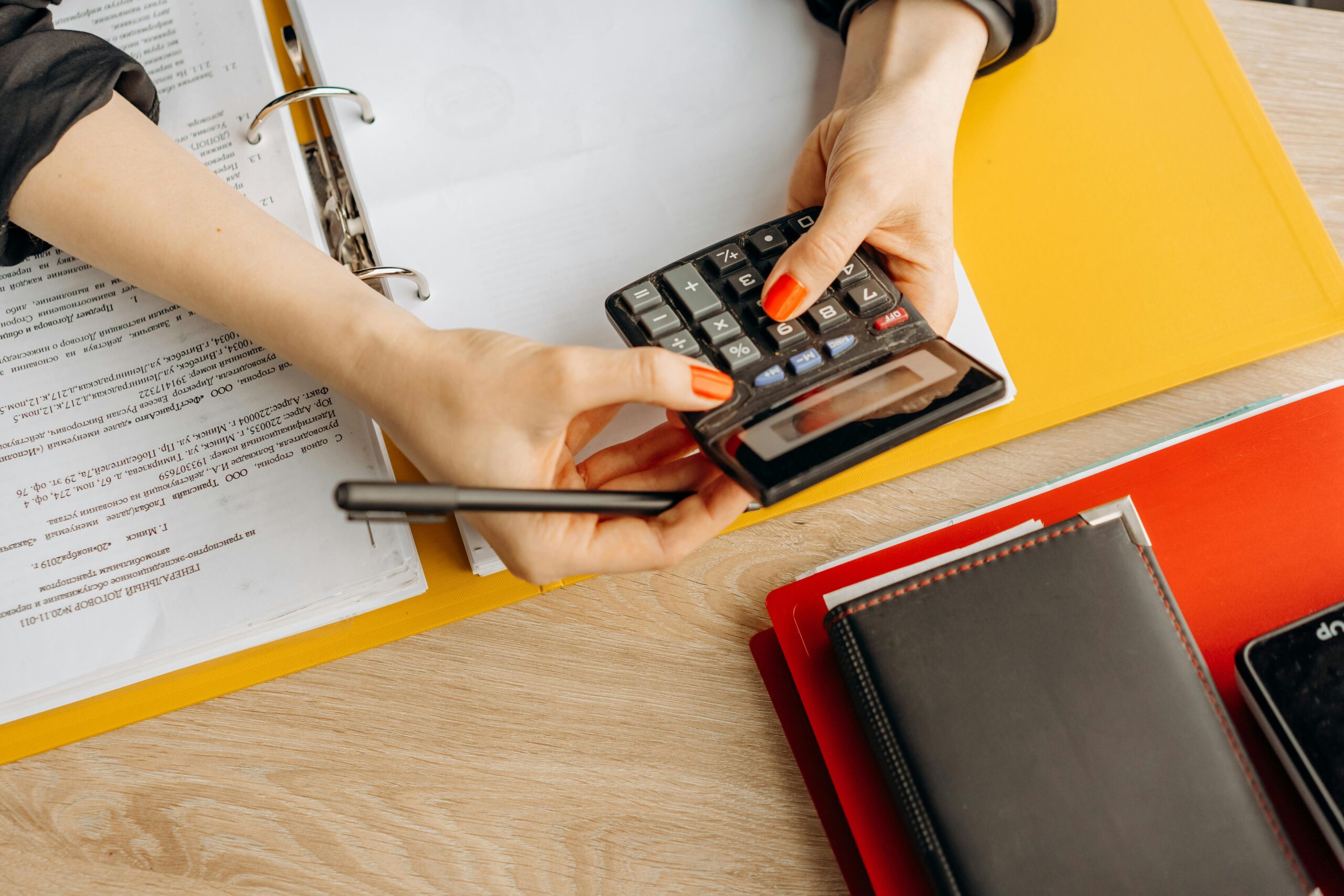 An office worker using a calculator