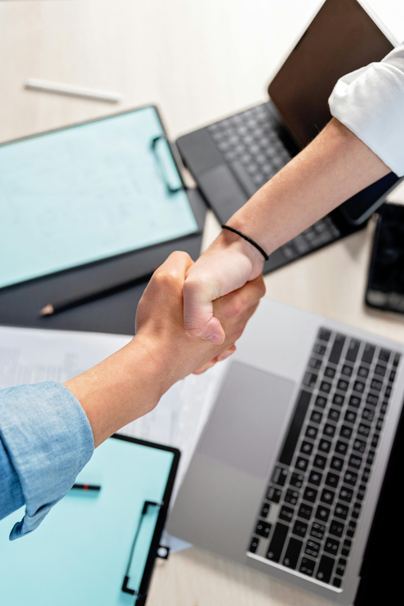Master Your Finances Essential Small Business Bookkeeping Tips - Handshake